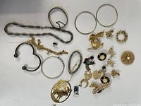 Full layout of assorted jewelry pieces showing variety and quantity