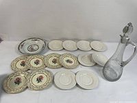 Group shot of all plates and pitcher