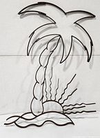 Full view of cast iron wall decor shaped like a palm tree and sunset with waves beneath.