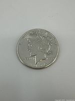 Obverse side of the 1926 Liberty Silver Dollar showing Lady Liberty profile.