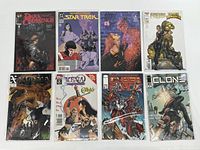 Lot of 8 comic books laid out, showing covers and bagged and boarded protection.