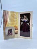 Hallmark Sentimental Valentine Barbie doll visible inside box with information flap open showing printed sentiment and artwork.