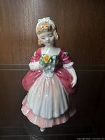 Front and side view of Royal Doulton 'Valerie' figurine showing painted details, colors and condition