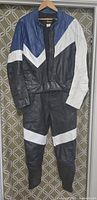 Front view of men's full BRISTOL motorcycle racing leather suit showing jacket with blue, black, and white color blocking and matching pants