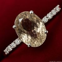 Top view of oval Zultanite center stone with diamond-set shoulders