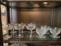 Shelf view of all cut crystal stemware and bowls