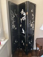 Full front view of three-panel folding screen