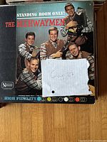 Photo of vinyl album cover 'Standing Room Only' by The Highwaymen with group note 'Group 27'