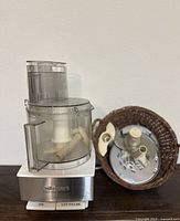 Photo showing Cuisinart food processor base with 14 cup clear bowl and feed tube attached
