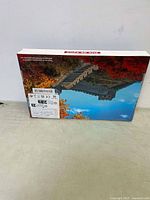 Box underside with product details and a photo of the Great Wall