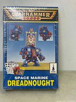 Front of sealed box showing Warhammer 40,000 logo, Space Marine Dreadnought art and title