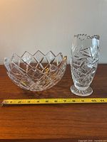 Photo of crystal bowl and one vase side by side with measuring tape showing size