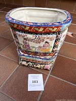 Top angle showing the oval interior and colorful decorative rim.