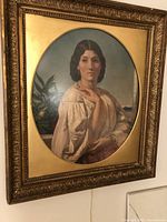 Full frontal view of pastel portrait in carved gilt wood frame
