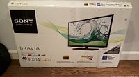 Box of Sony Bravia 46 inch EX64 LED TV showing branding and features including Motionflow XR 240, Full HD 1080p, LED technology.