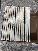 All 12 Road to Avonlea paperback books neatly lined up showing titles and condition.