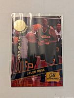 Front of the basketball card featuring Jalen Rose in a University of Michigan uniform, with a gold foil seal and 'Promo 1 of 10000' text.