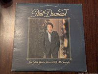 Front cover of the vinyl album showing Neil Diamond standing, wearing a suit, with title and artist name in gold lettering.