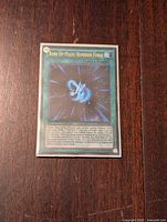 Front holographic view of the Yu-Gi-Oh! Rank-Up-Magic Numeron Force Spell Card.