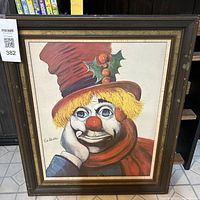 Full view of the framed lithograph showing the clown with red nose, top hat, and scarf, signed by Red Skelton.
