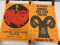 Two posters side by side showing the 1970 Chinese Year of the Dog festival poster and the 1967 Chinese New Year parade ram poster.