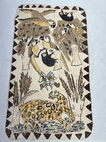 Full view of laminated painting showing animal montage including standing cheetah and multiple birds in trees with sloths hanging.