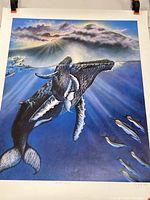 Full front view of the signed limited edition print depicting whales underwater with a sunrise and mountains in the background.