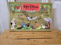Closed Disney Treasure Chest box with colorful Disney character illustrations on the exterior.