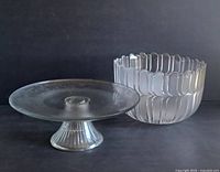 Both frosted crystal bowl and frosted glass cake pedestal base displayed side by side showing size and design contrast.