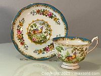 Saucer and tea cup separately to show individual design details and condition