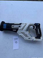 Side view of HART cordless reciprocating saw showing the body with battery slot and handle.