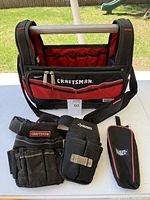 Large Craftsman open-top tool bag with shoulder strap, smaller tool pouches in front