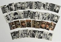Overview photo of 46 Beatles collector cards from the 1960s; a mix of black and white and color images, laid out in rows.