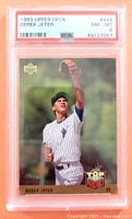 Front view of the Derek Jeter 1993 Upper Deck rookie card graded PSA 8, showing player image and card details in the encapsulated holder.