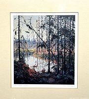 Close-up of the print showing forest and river scene under canopy of trees with visible signature and title