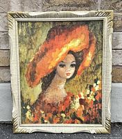 Front view of the framed art print showing a girl in an orange sunbonnet surrounded by flowers.