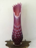 Front view showing hobnail pattern on lower half and flared ruffled lip