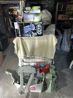 Loose figures and playset parts displayed outside packaging