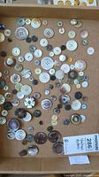 Overview of collection of vintage buttons, showing wide variety in colors, sizes, and styles.