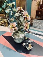 Both vintage jade and gemstone floral bonsai trees displayed with their respective pots and floral detail