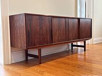 Three-quarter angle view showing left side, front, and legs