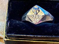 Sterling silver ring with Cubs BSA emblem in jewelry box.
