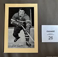 Front view showing the black and white hockey photo of Phil Goyette attached to the manila backing card.