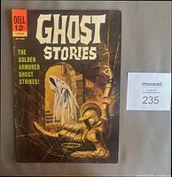 Front cover photo of the Dell Comics Ghost Stories issue #6 from 1964, showing the title and cover illustration of a golden armored knight and ghost in a dungeon.