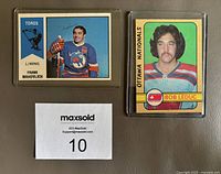 Front photo of Frank Mahovlich Toros and Bob Leduc Ottawa Nationals hockey cards alongside a Maxsold number card.