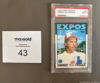 Front view of the 1986 Topps Traded Andres Galarraga Expos baseball card graded PSA 9 MINT inside protective case.