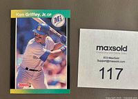 Front of Ken Griffey Jr. baseball card showing player in batting stance with Mariners logo and Donruss branding.
