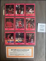 Full view of 9-card basketball set featuring Hakeem Olajuwon from 1993 laid out in a transparent protective sleeve alongside certificate of authenticity
