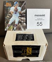 Closed box of 1996 Pinnacle Select Certified NFL football card set with John Elway QS Serials card on top