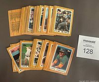 Several miniature baseball cards arranged showing front sides with wood grain pattern and player images including Jose Canseco and Jim Rice.